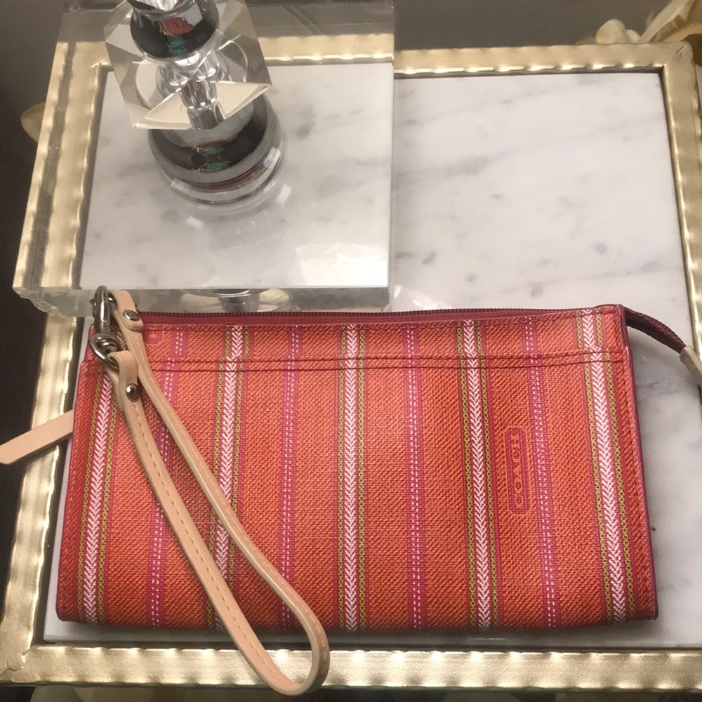 Authentic coach clutch